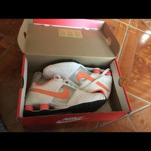 Orange and white nike